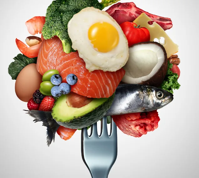 image of a fork holding a variety of foods