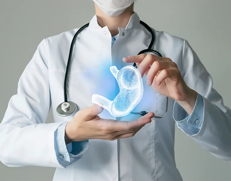 image of a doctor from the neck down holding a computer-animated organ