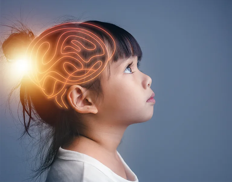 young girl with black hair from the side profile looking up with the image of a brain abstractly drawn over her head