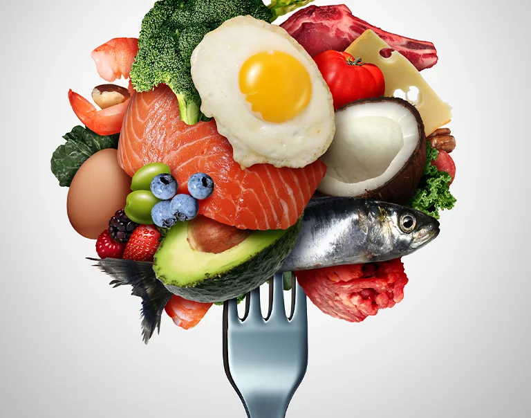 image of a fork holding a variety of foods